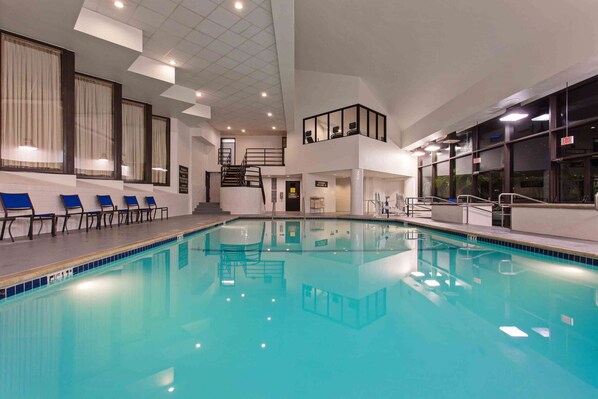 Indoor pool, open 6:00 AM to 10:00 PM, pool loungers