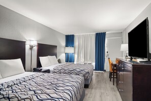 Standard Room, 2 Double Beds, Non Smoking | Desk, laptop workspace, iron/ironing board, WiFi - Rodeway Inn Orange Park - Jacksonville near Naval Air Station (Orange Park)