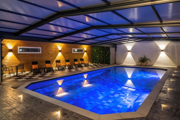 Indoor pool, open 6:00 AM to 10:00 PM, sun loungers