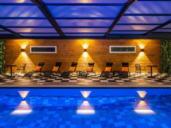 Indoor pool, open 6:00 AM to 10:00 PM, sun loungers
