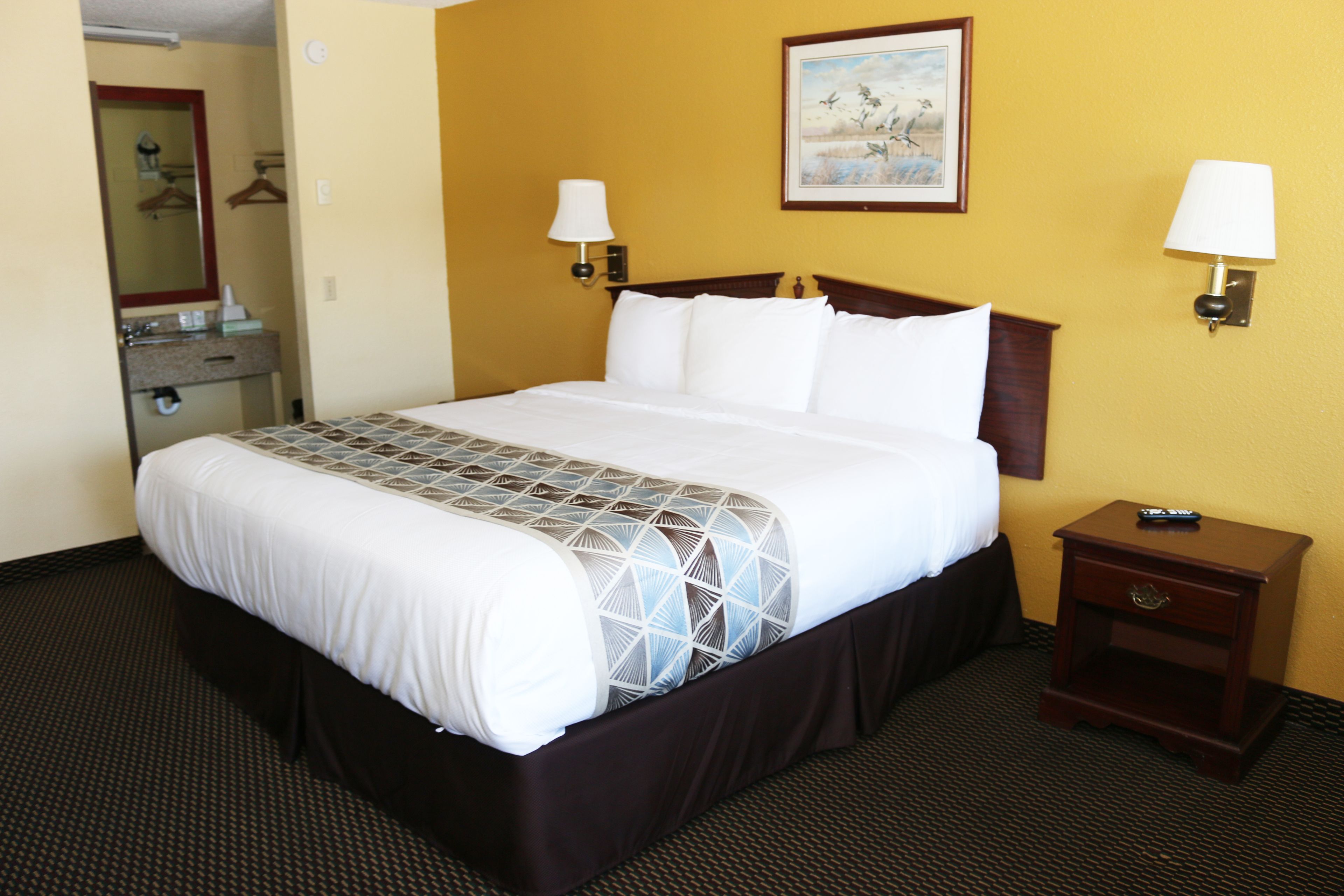 room, 1 king bed | blackout curtains, iron/ironing board, free wifi, bed sheets