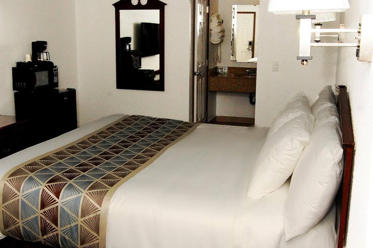 blackout curtains, iron/ironing board, free wifi, bed sheets