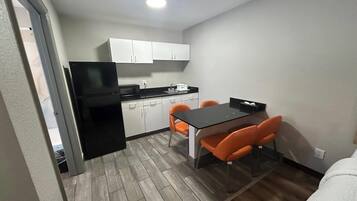 Efficiency, Room, 2 Queen Beds, Non Smoking | In-room safe, desk, iron/ironing board, free cots/infant beds