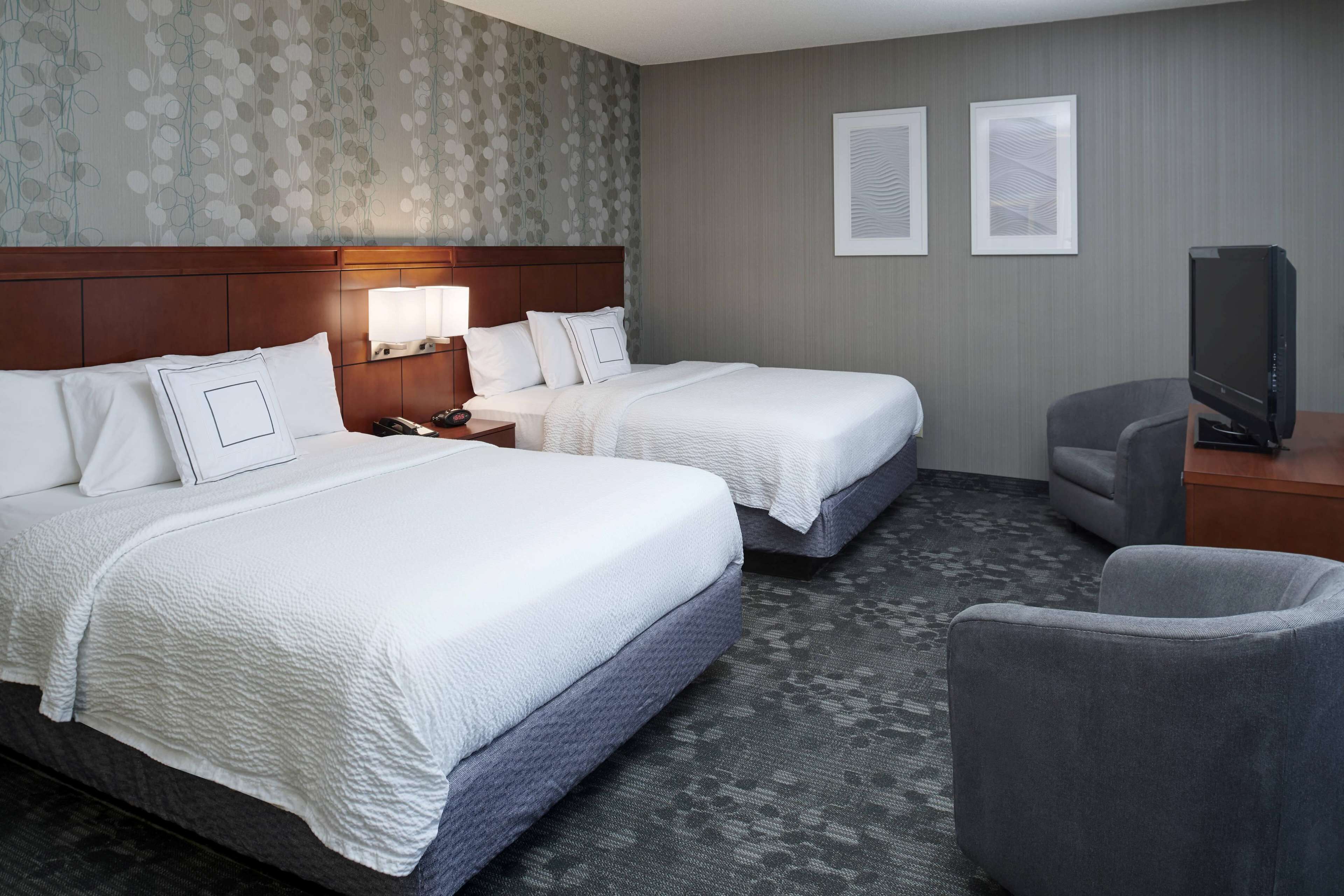 suite, multiple beds (one bedroom) | individually furnished, desk, laptop workspace, iron/ironing board