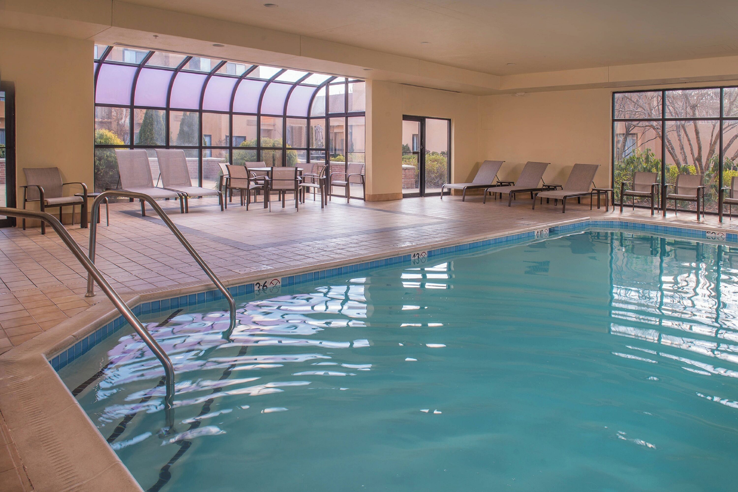 Indoor pool, open 6:00 AM to 10:00 PM, sun loungers