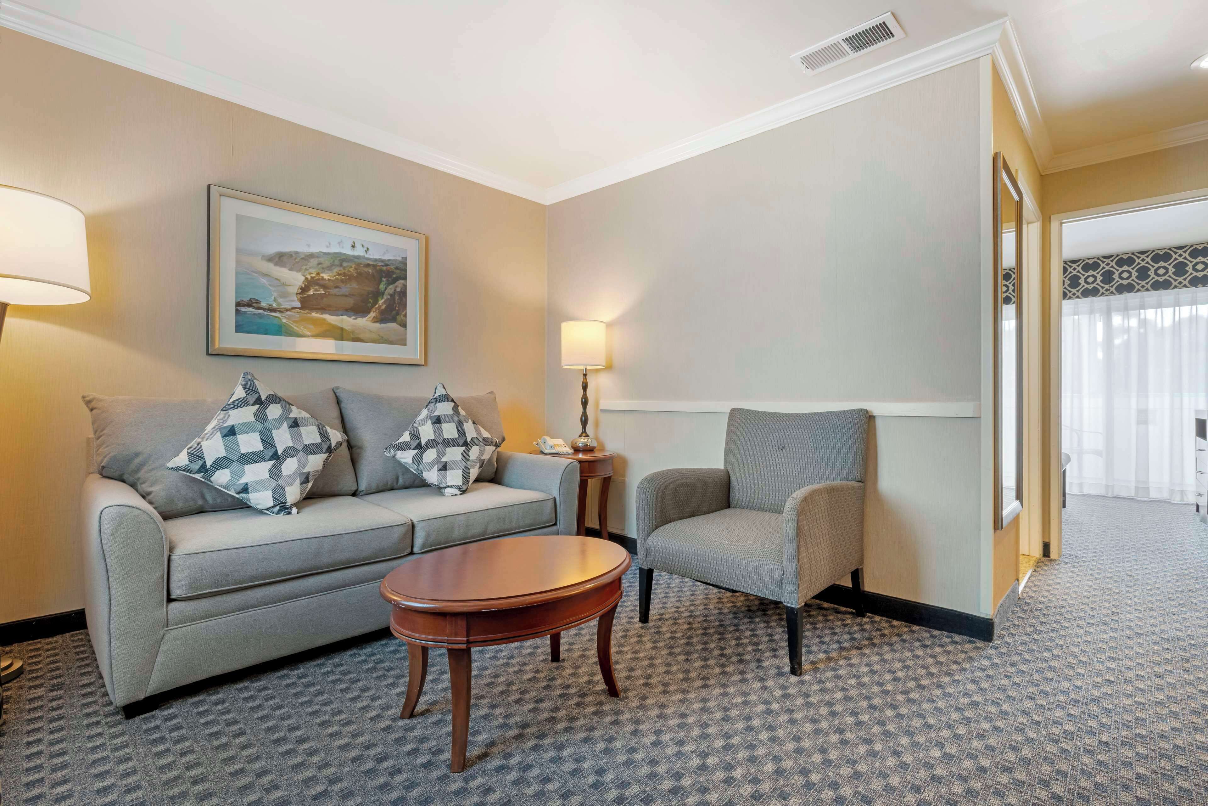 suite, 1 king bed, non smoking, balcony | 1 bedroom, desk, blackout curtains, iron/ironing board