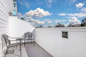 Suite, 2 Queen Beds, Non Smoking, Balcony | 1 bedroom, desk, blackout drapes, iron/ironing board