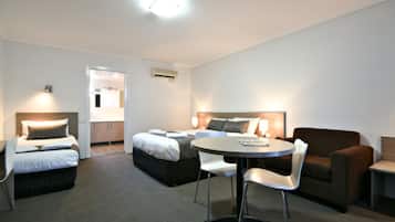 Deluxe Suite with Spa Bath | Premium bedding, desk, blackout drapes, iron/ironing board