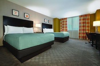 West Tower Double Queen Room | In-room safe, blackout drapes, free WiFi, bed sheets at Circus Circus Hotel, Casino & Theme Park
