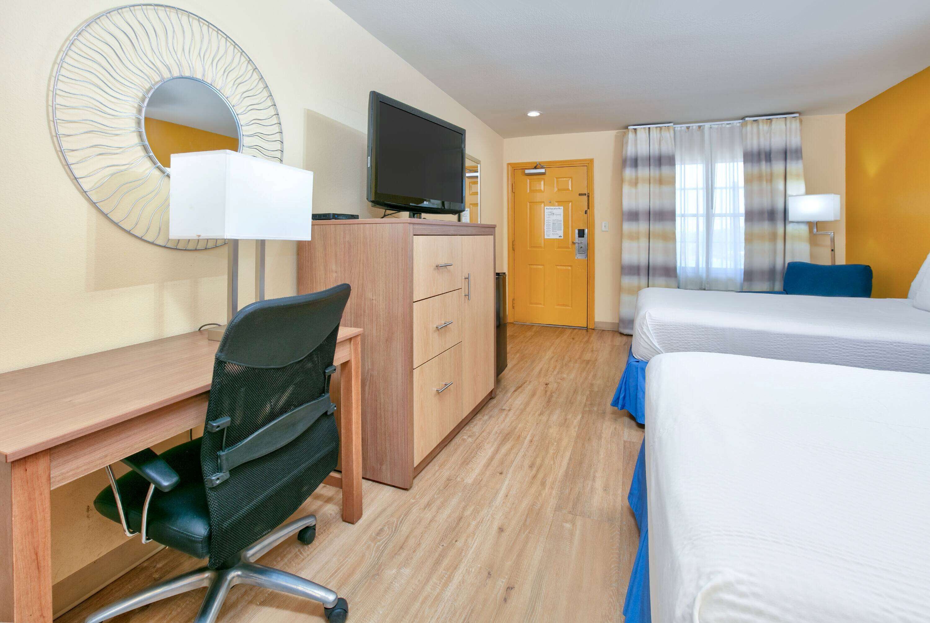 Desk, blackout curtains, iron/ironing board, rollaway beds