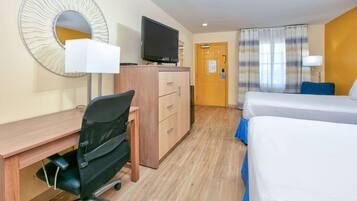 Desk, blackout curtains, iron/ironing board, rollaway beds