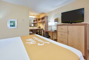 Chambre Standard, 1 très grand lit, fumeurs | Bureau, rideaux occultants, fer et planche à repasser