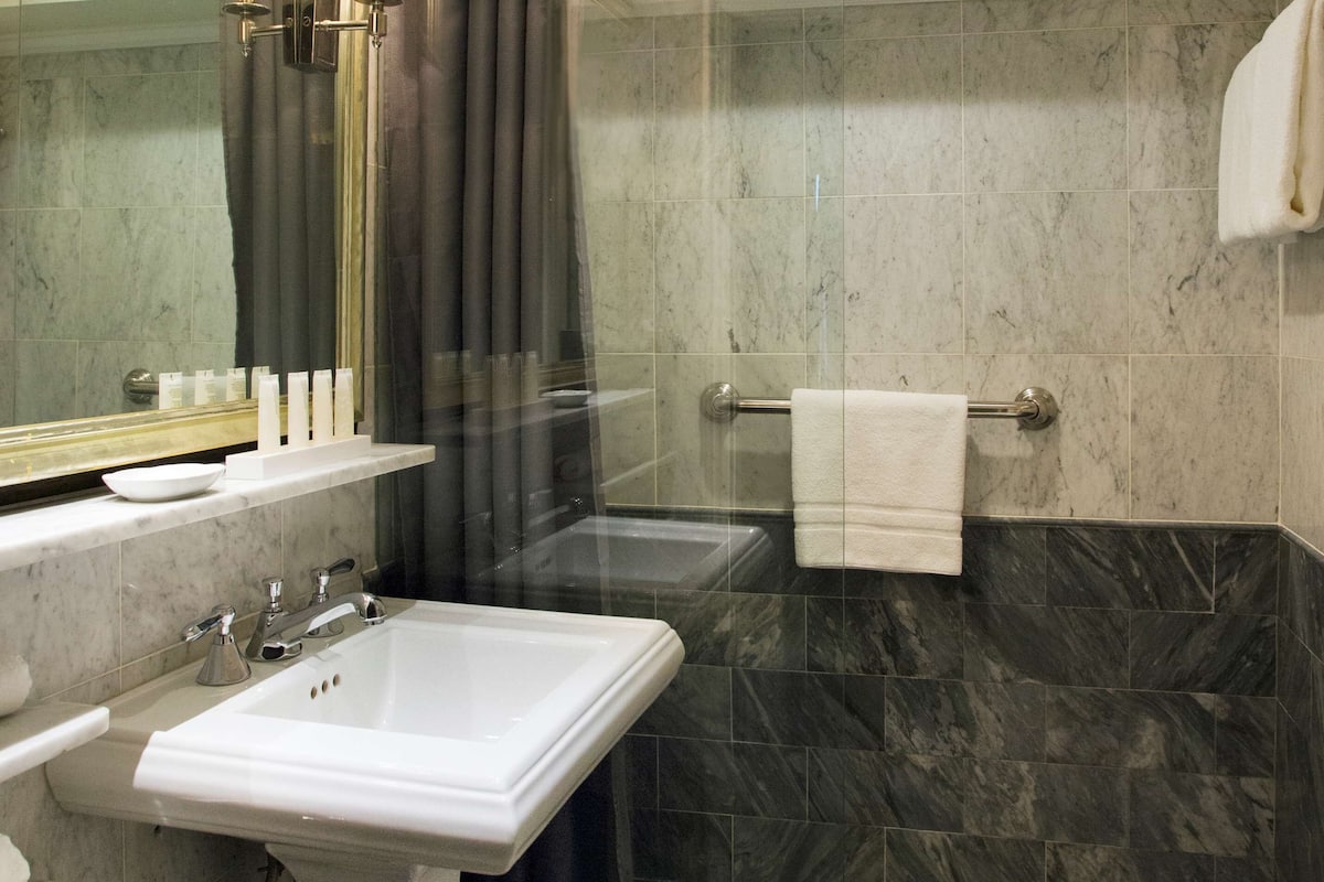 shower, designer toiletries, hair dryer, bathrobes