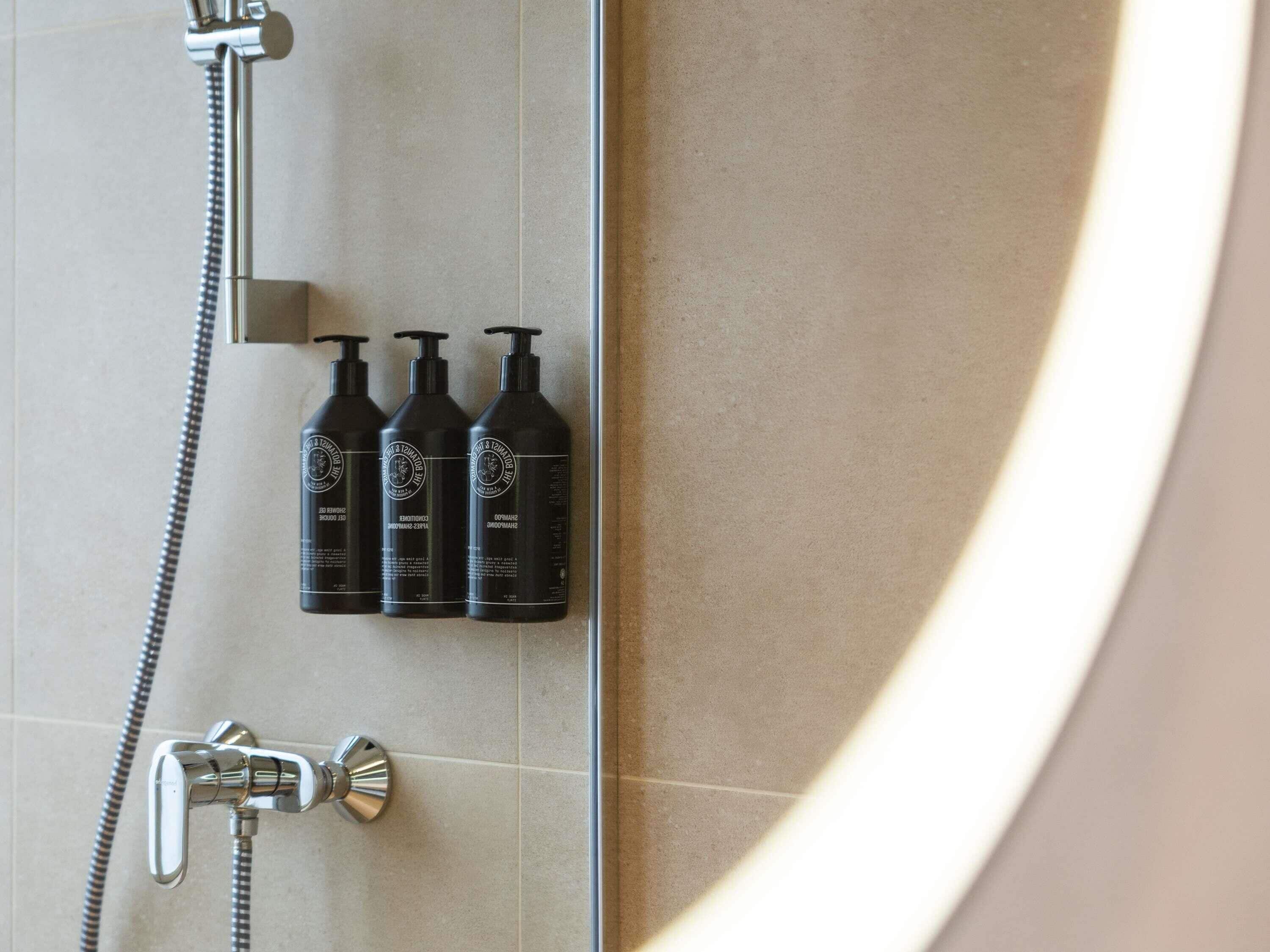 Shower, rainfall showerhead, eco-friendly toiletries, hair dryer