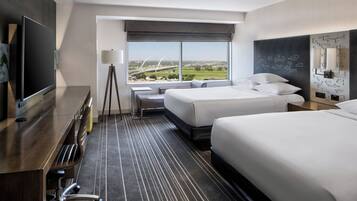 Premium bedding, down comforters, pillowtop beds, in-room safe