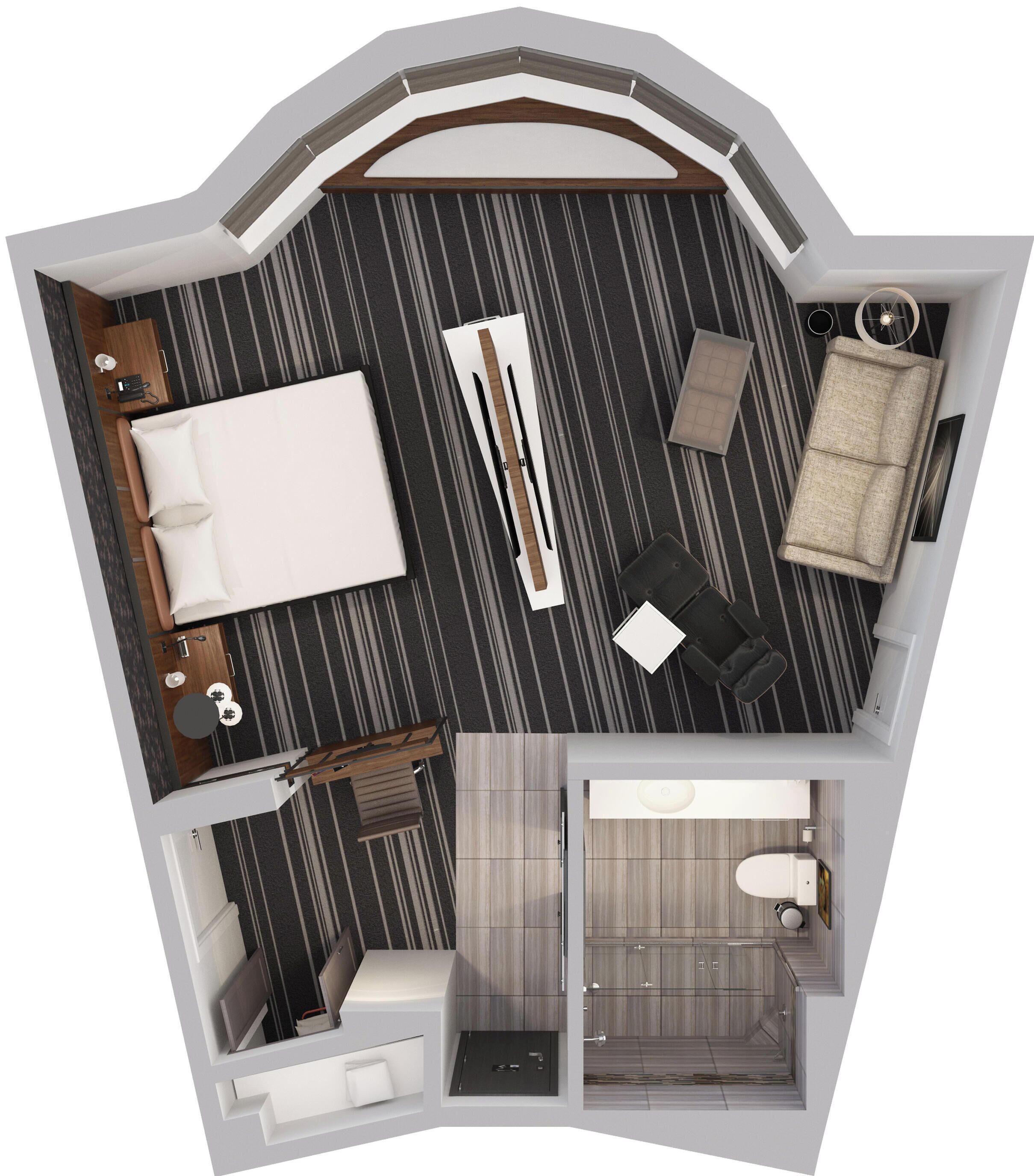 Ein modernes Hotelzimmer mit Bett, Sitzecke, Schreibtisch und Bad.