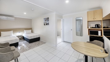 Essential Family Room | 1 bedroom, laptop workspace, iron/ironing board, free WiFi