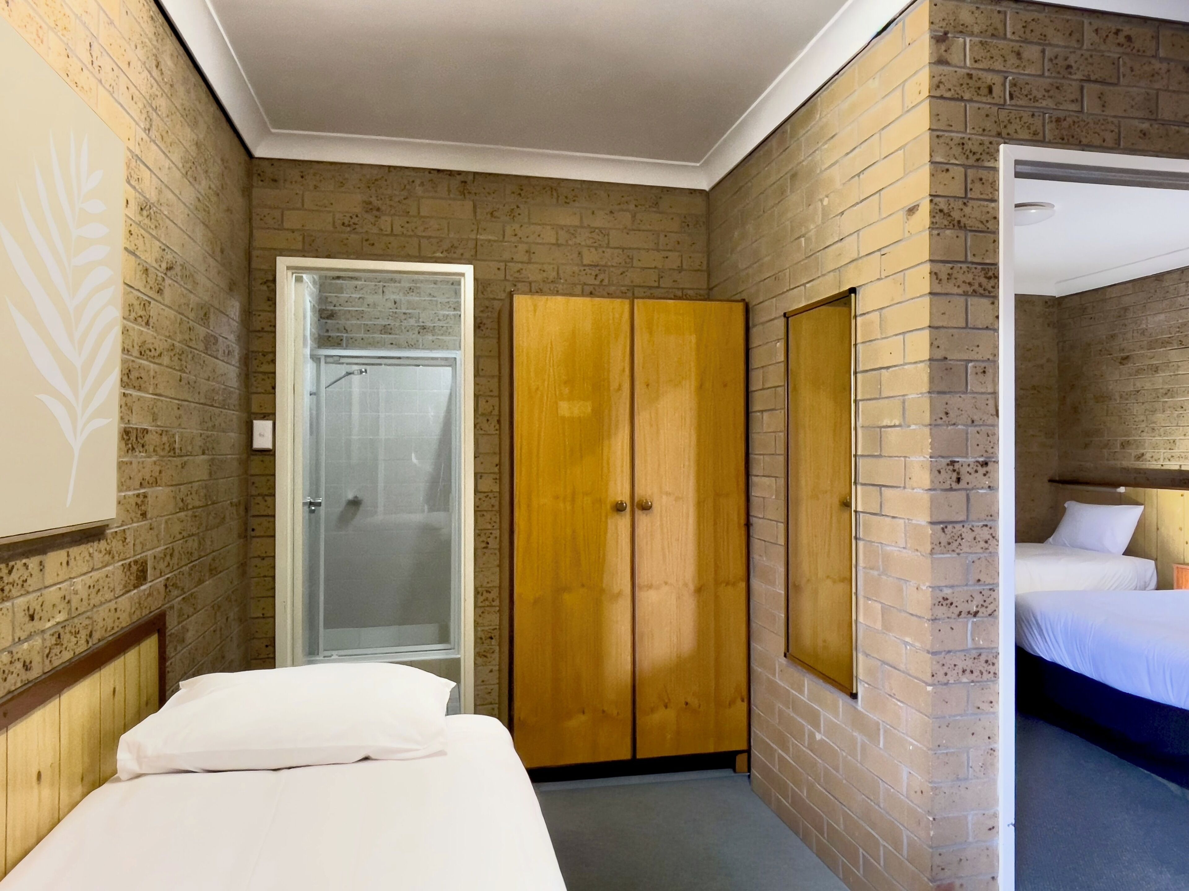 Budget Family Room | Laptop workspace, iron/ironing board, free WiFi, bed sheets