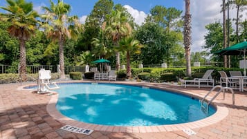 Outdoor pool, open 9 AM to 9:00 PM, pool umbrellas, pool loungers