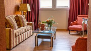 Suite superior | Sala d'estar | Televisor de pantalla plana