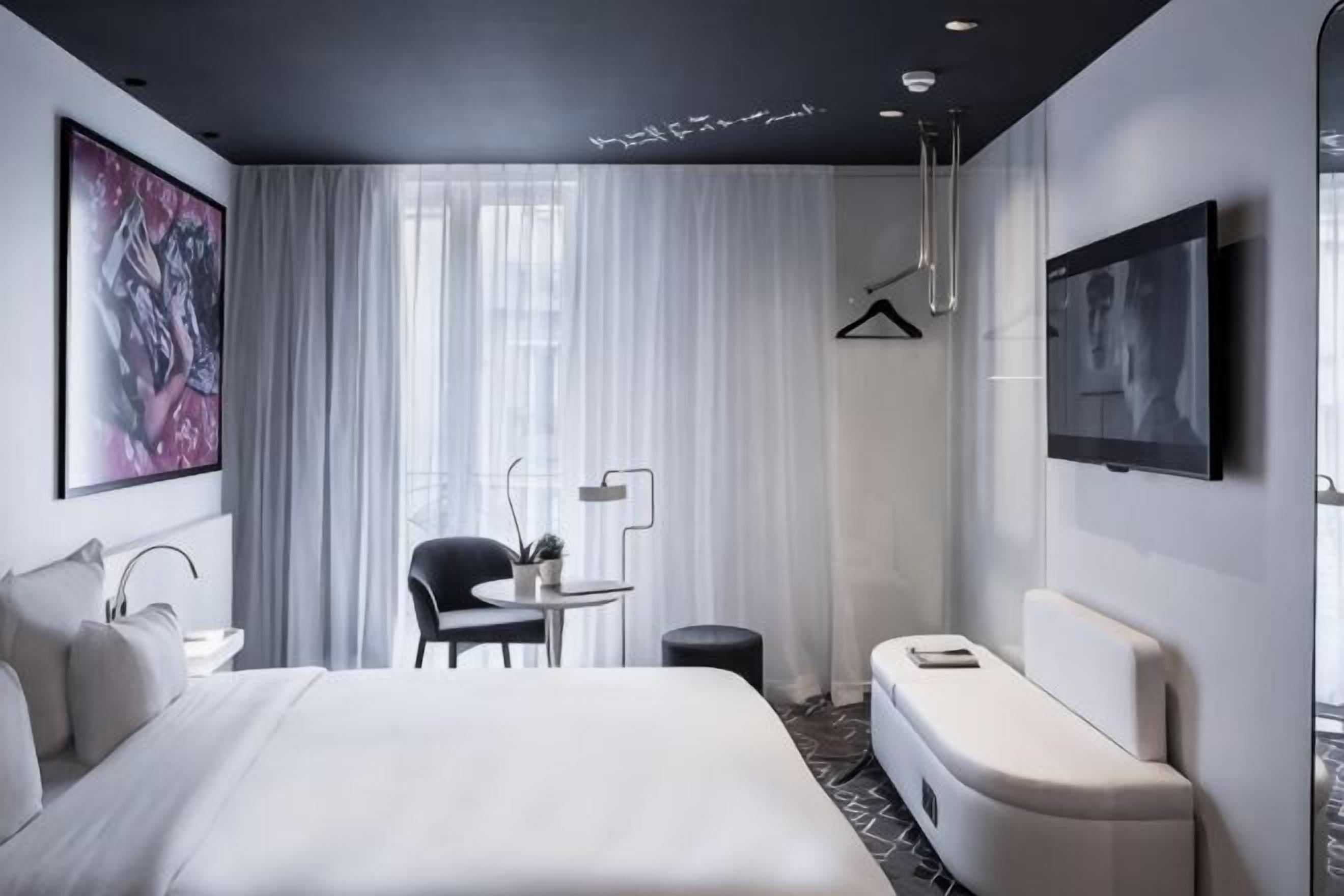 Premium bedding, in-room safe, desk, soundproofing