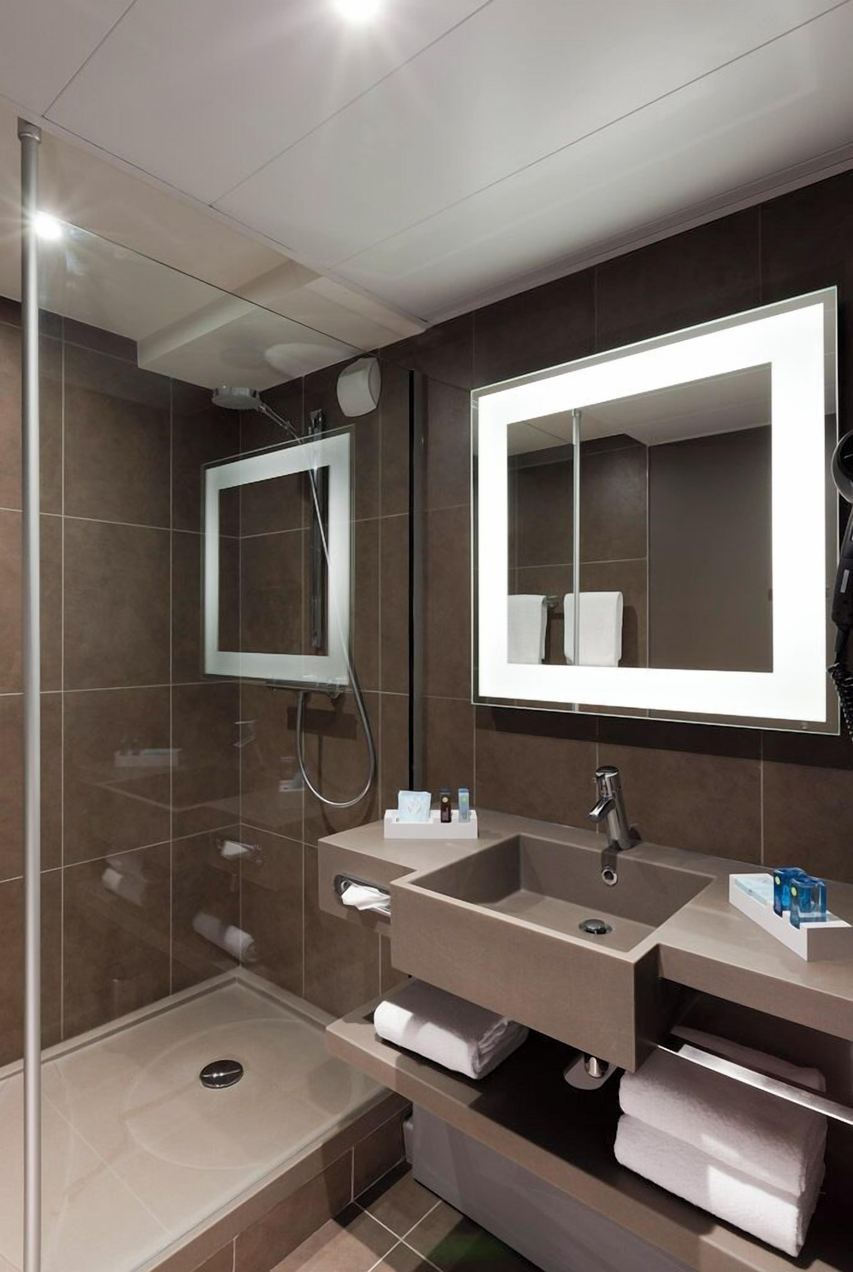 eco-friendly toiletries, hair dryer, towels, soap