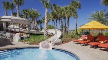 Relax by the pool surrounded by palm trees and enjoy a refreshing swim or lounge on a comfortable chair.