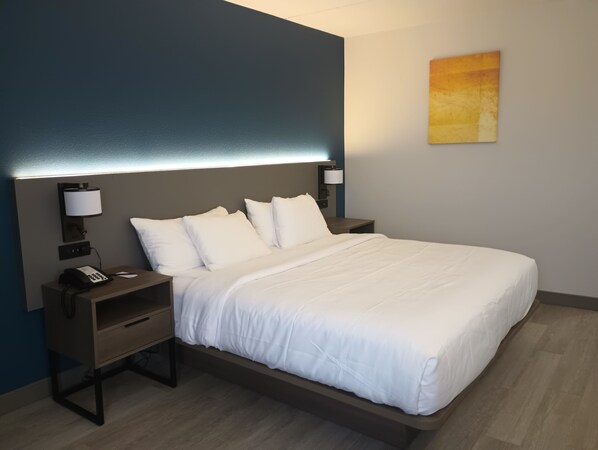 Desk, laptop workspace, iron/ironing board, free cots/infant beds