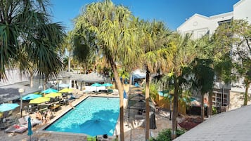 Outdoor pool, open 8:00 AM to 7:00 PM, pool loungers