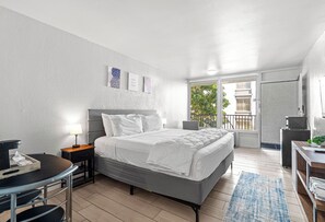 Premium bedding, pillow-top beds, blackout curtains, iron/ironing board