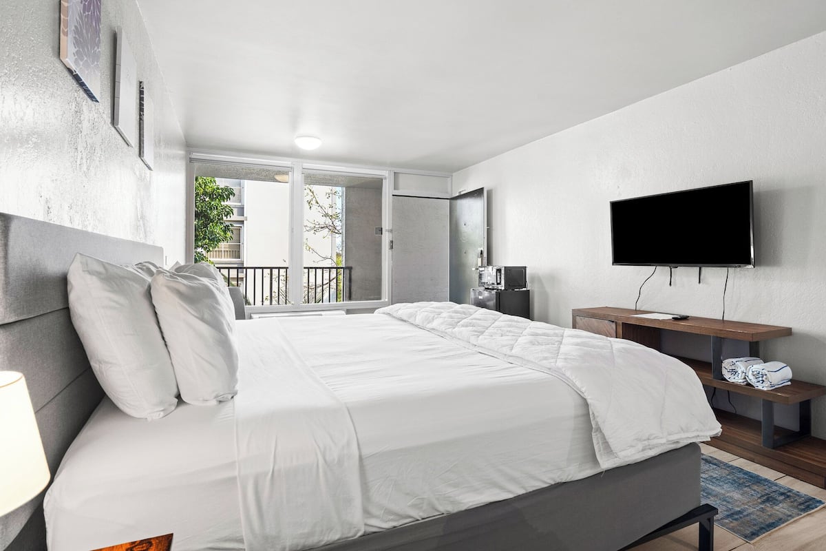 Premium bedding, pillow-top beds, blackout curtains, iron/ironing board