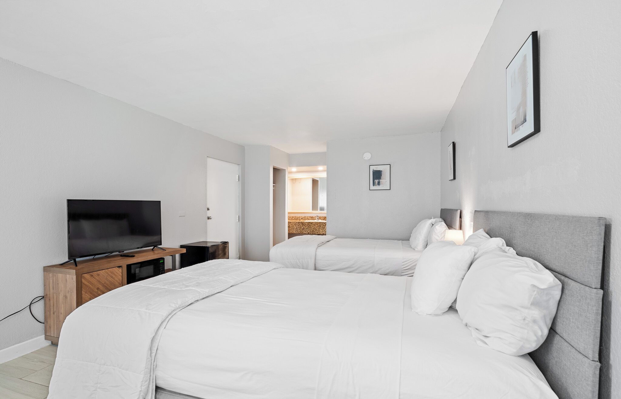 Premium bedding, pillow-top beds, blackout curtains, iron/ironing board