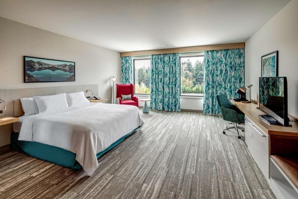 Premium bedding, down comforters, pillowtop beds, minibar