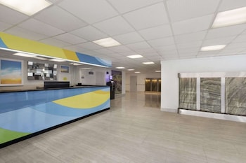 Hotel entrance and lobby at enVision Hotel Miami International Airport