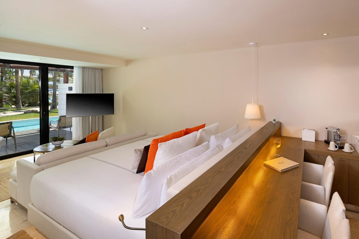 Premium bedding, down duvets, pillow-top beds, free minibar