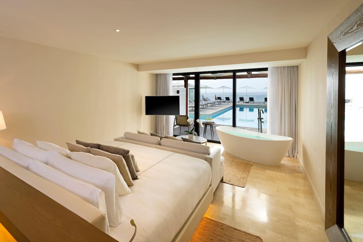 Premium bedding, down duvets, pillow-top beds, free minibar
