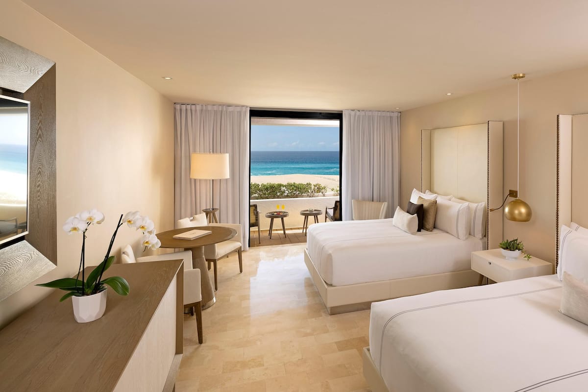 Premium bedding, down duvets, pillow-top beds, free minibar