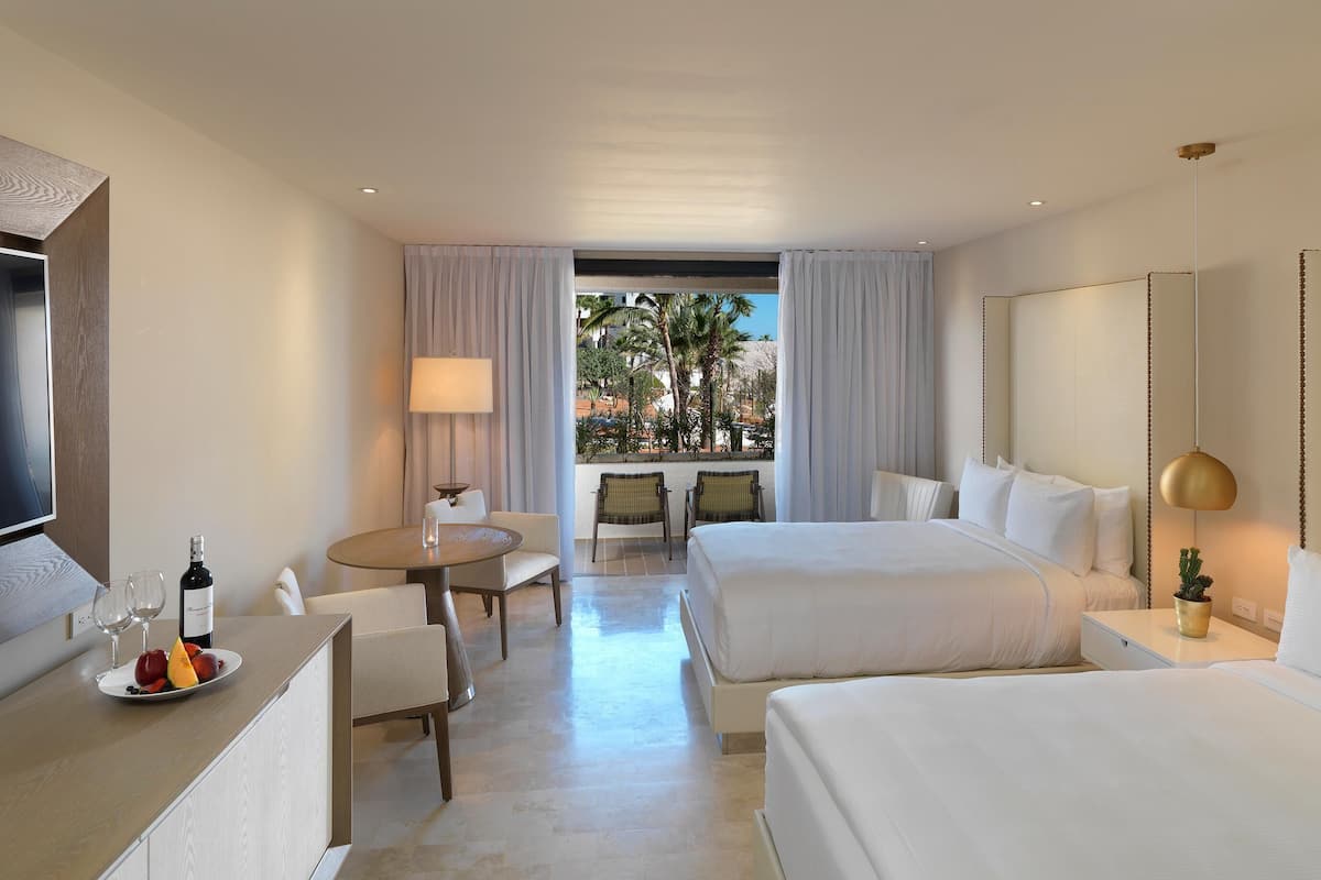Premium bedding, down duvets, pillow-top beds, free minibar