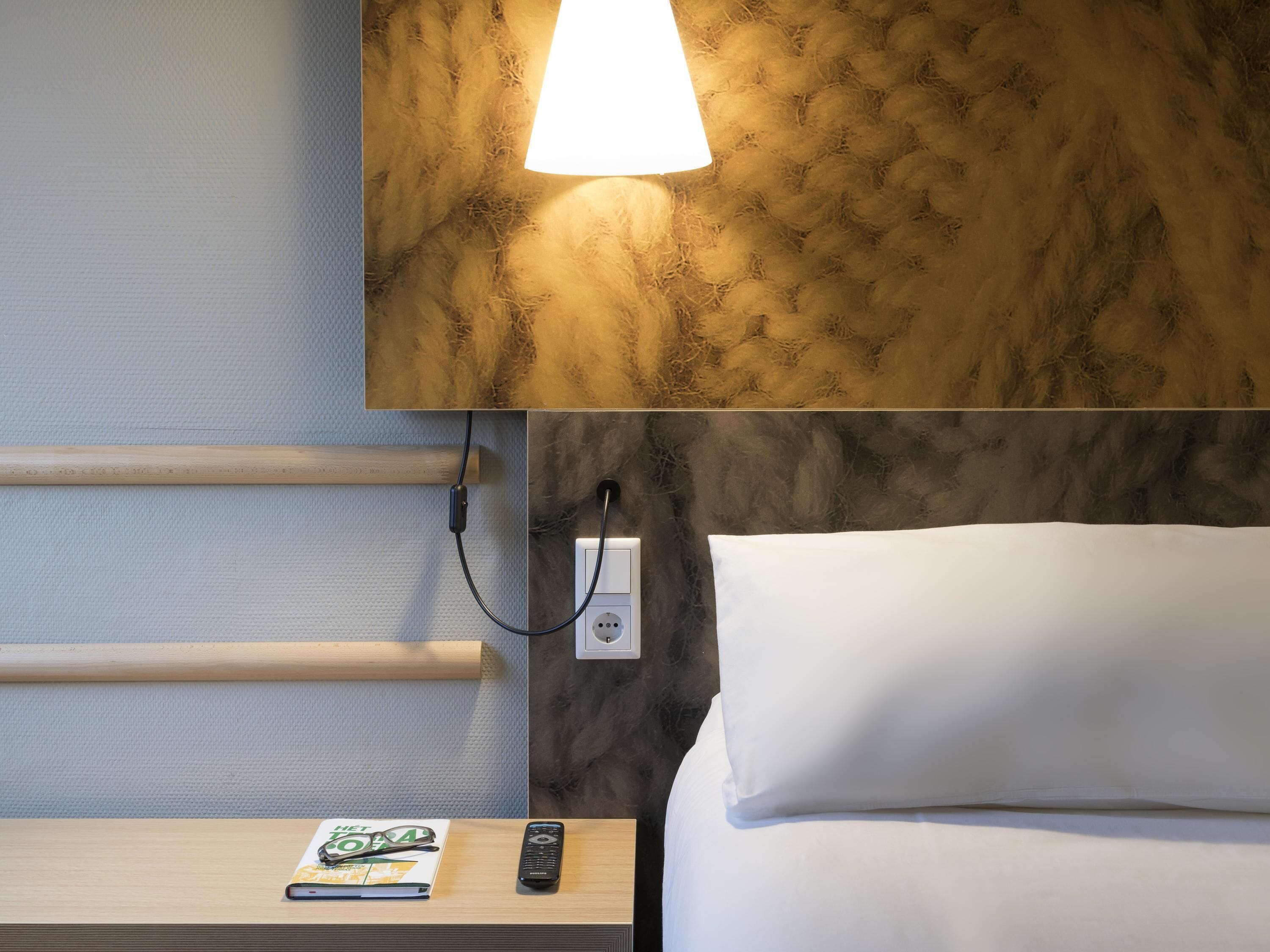 Premium bedding, desk, laptop workspace, blackout curtains