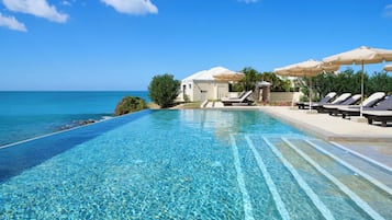 Outdoor pool, open 9 AM to 6 PM, sun loungers