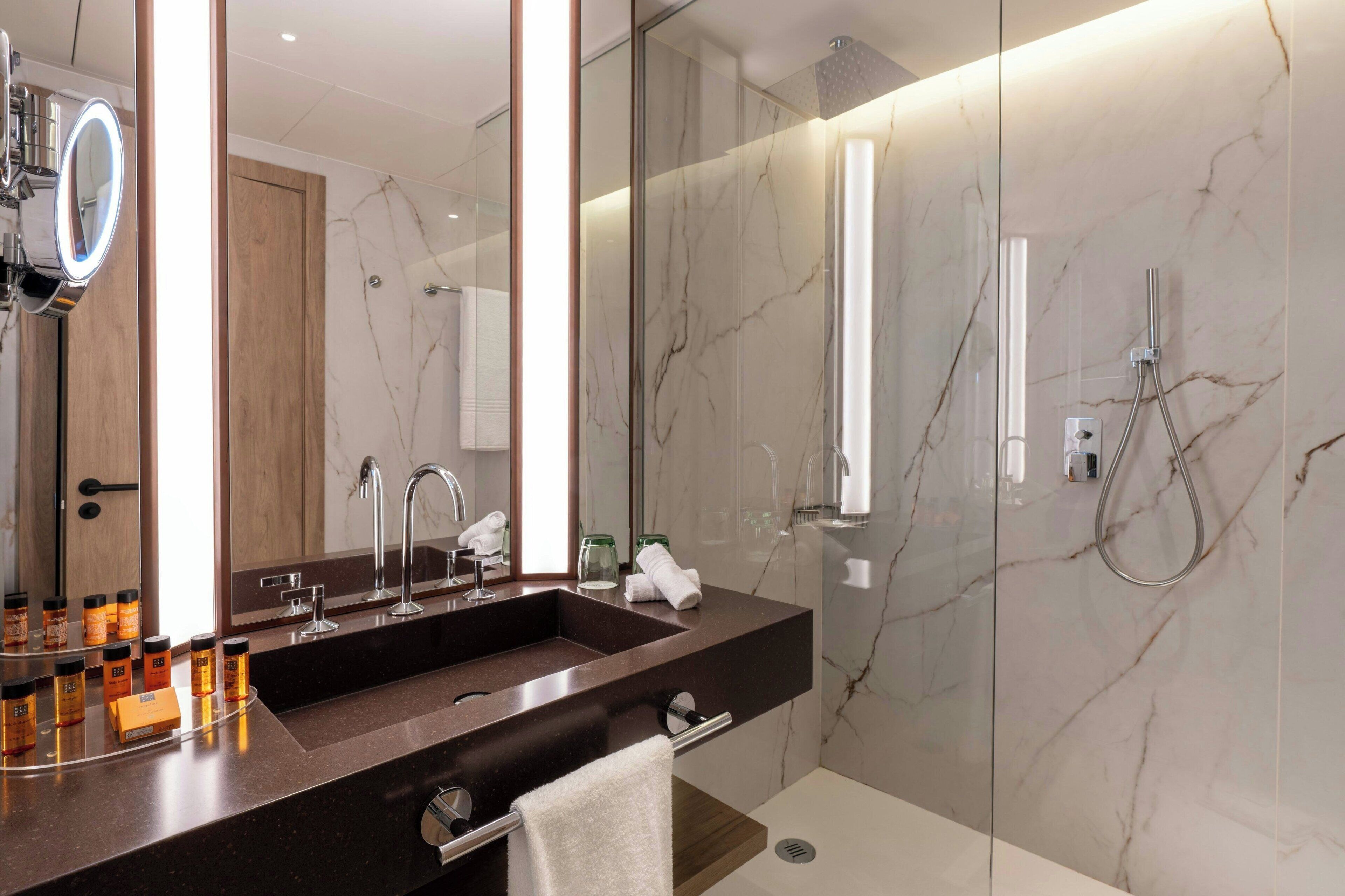 free toiletries, hair dryer, slippers, towels