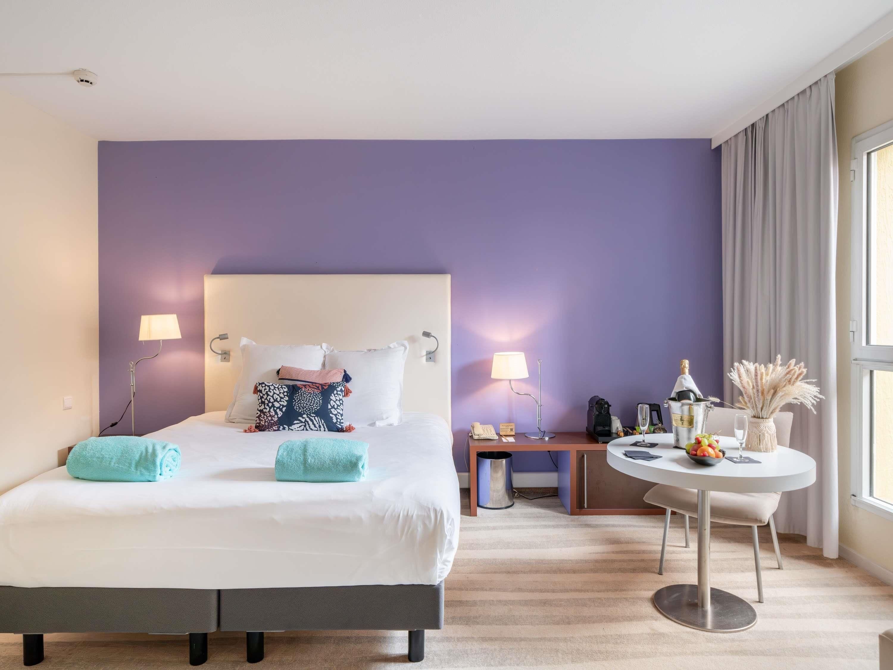 Suite Junior, 1 lit double et 1 canapé-lit | Rideaux occultants, chambres insonorisées, fer et planche à repasser