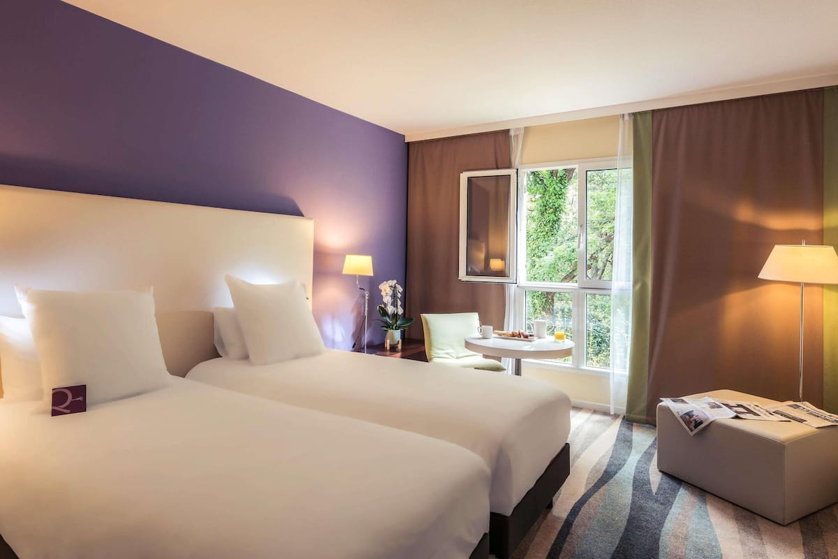 Habitación estándar con 2 camas individuales, 2 camas individuales | Cortinas opacas y sistema de insonorización