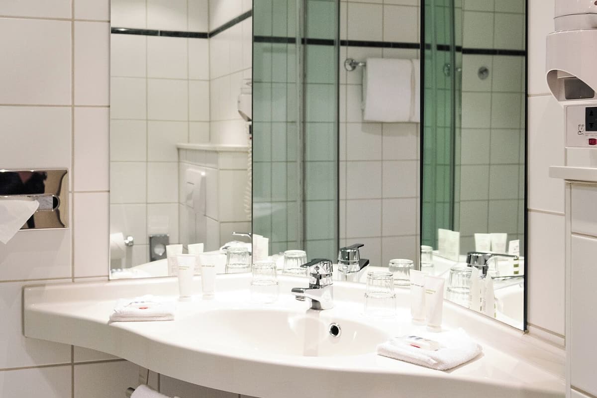 superior double room | bathroom | free toiletries, hair dryer, towels