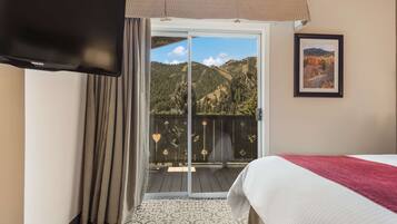 Edredón, camas con pillow-top y caja de seguridad en la habitación