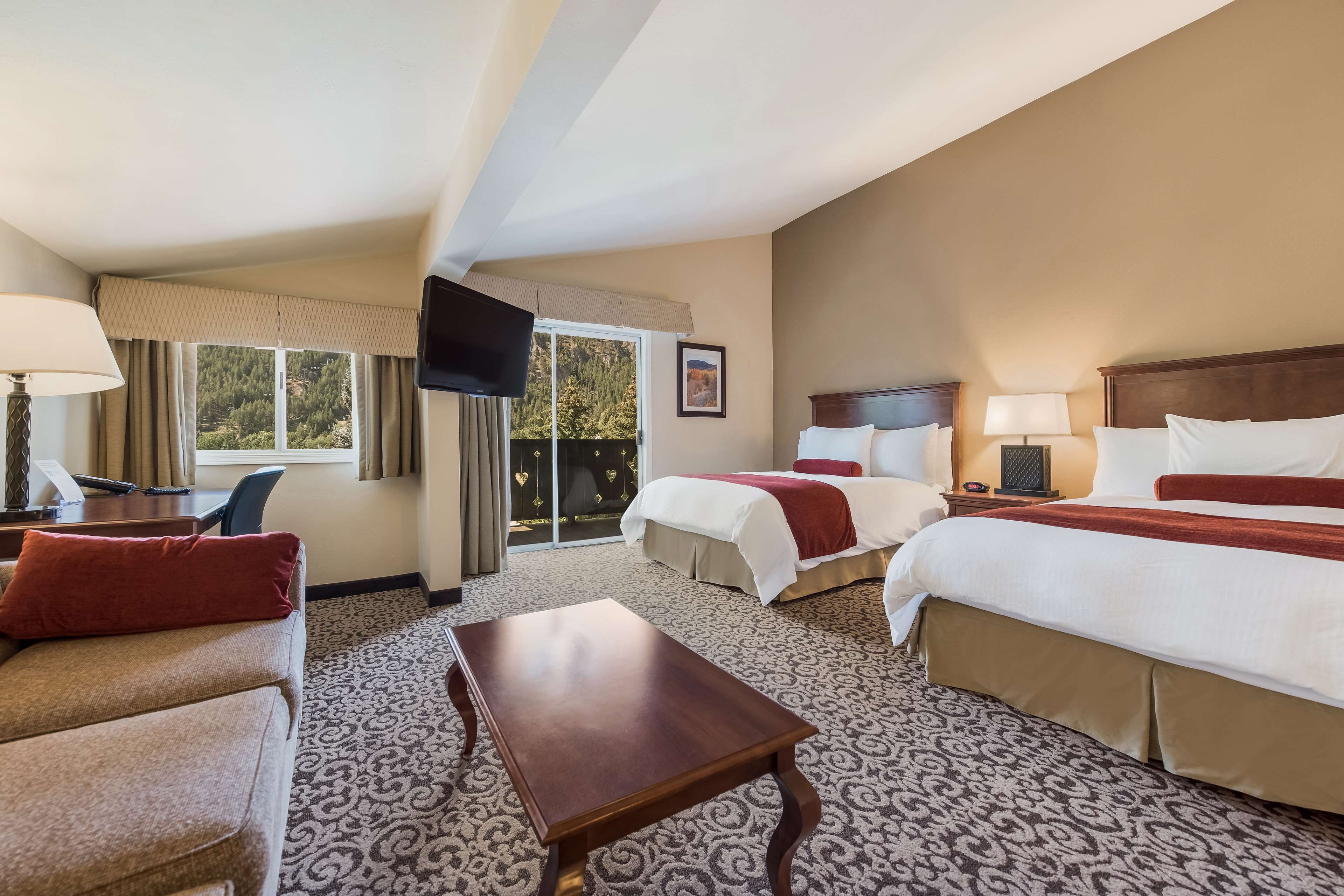 down duvets, pillow-top beds, in-room safe, desk