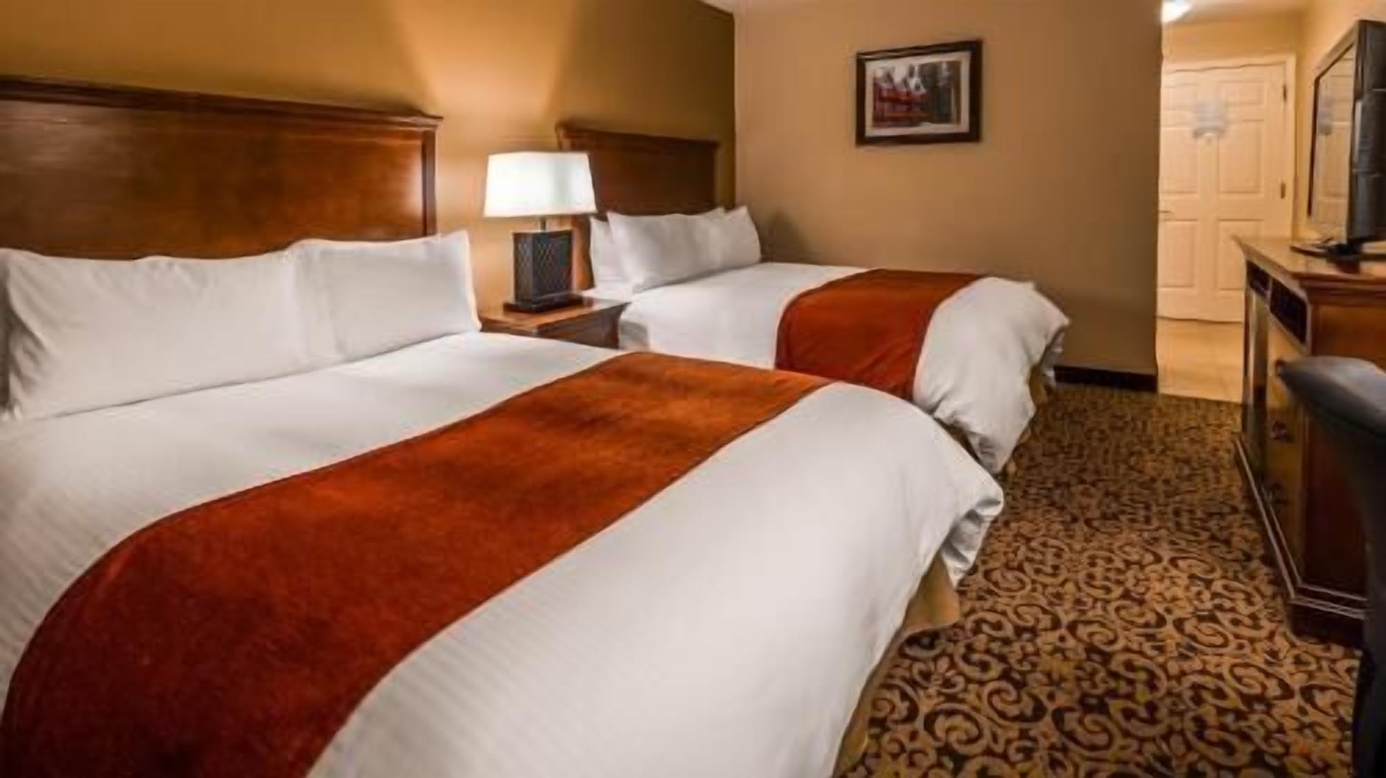 Down comforters, pillowtop beds, in-room safe, desk