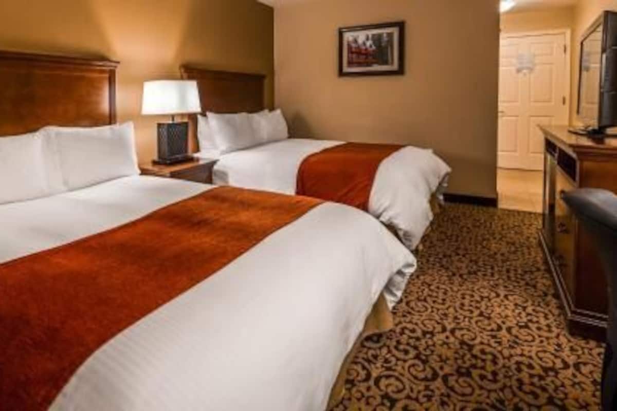 Down comforters, pillowtop beds, in-room safe, desk