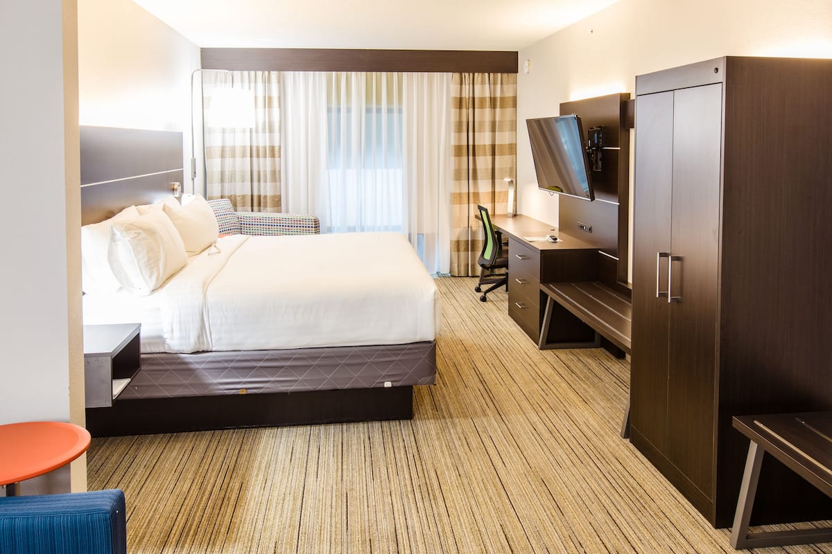 Suite, 1 King Bed with Sofa bed | In-room safe, desk, iron/ironing board, free cots/infant beds