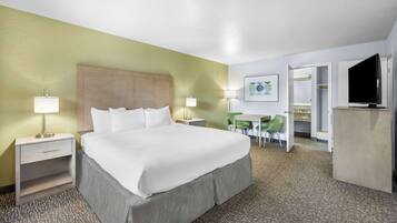 Suite, 1 King Bed, Non Smoking, Jetted Tub (with Sofabed) | Blackout drapes, iron/ironing board, free WiFi, bed sheets